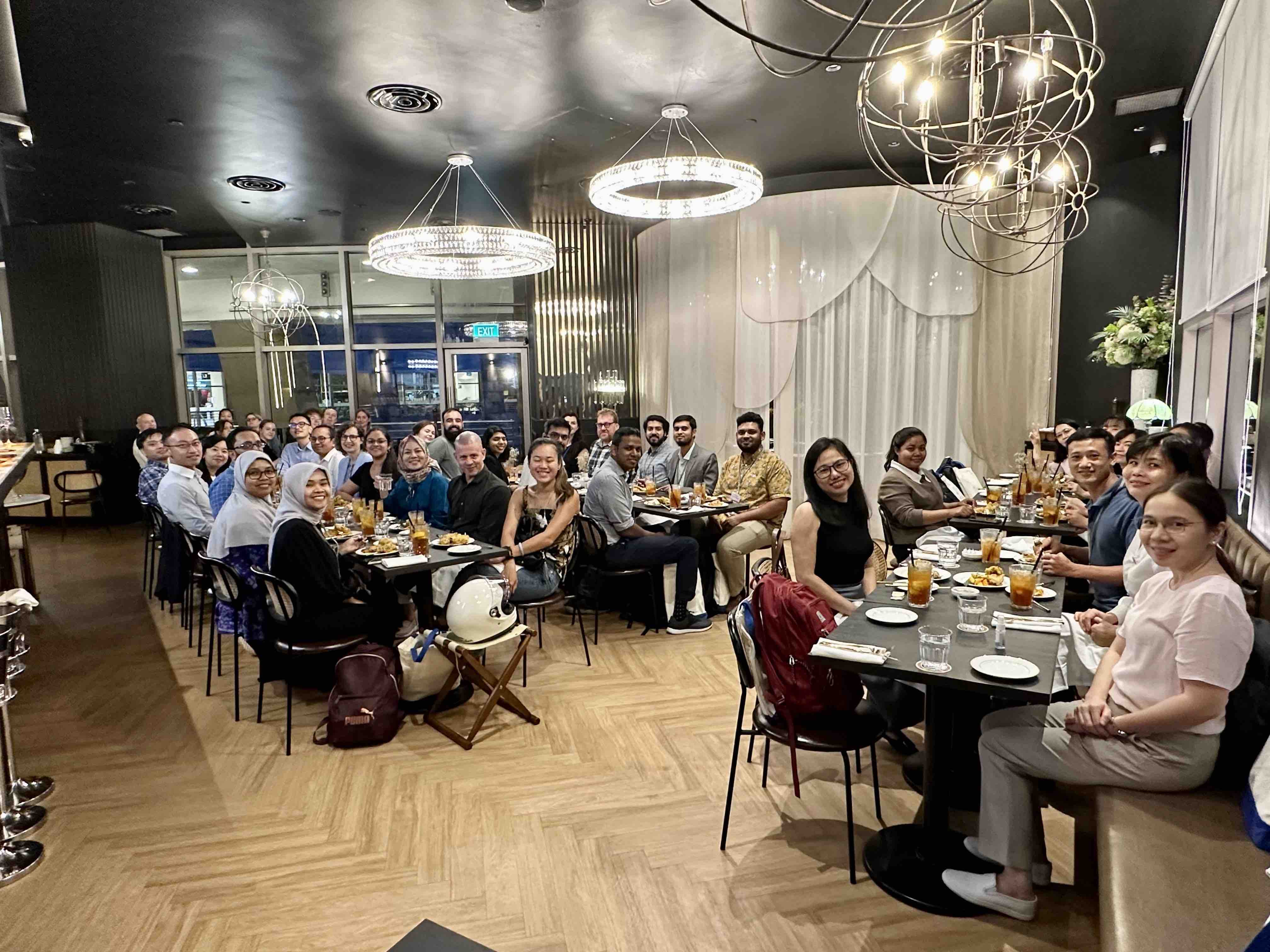 Workshop participants and trainers at the welcome dinner