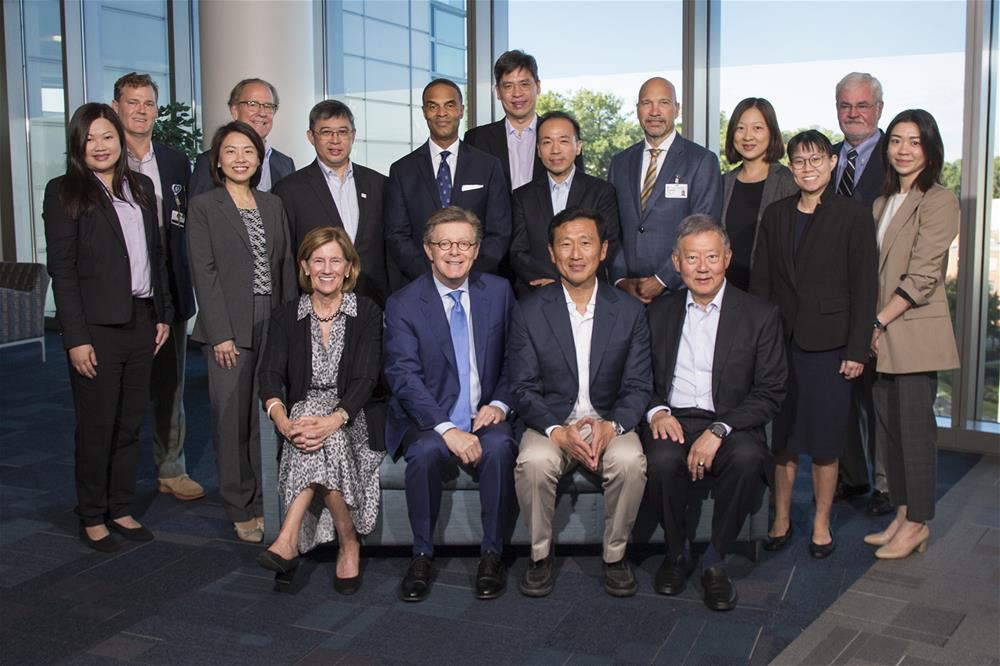 Minister for Health Mr Ong Ye Kung poses for a group shot with his hosts