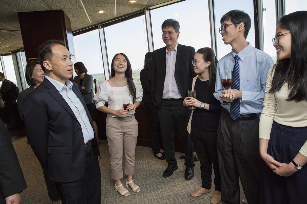 NUS Provost Professor Aaron Thean (left) together with Duke-NUS Senior Associate Dean Professor Tan Say Beng (third from left) meets with Singaporean students in Durham // Credit: Chris Hildreth/Rooster Media