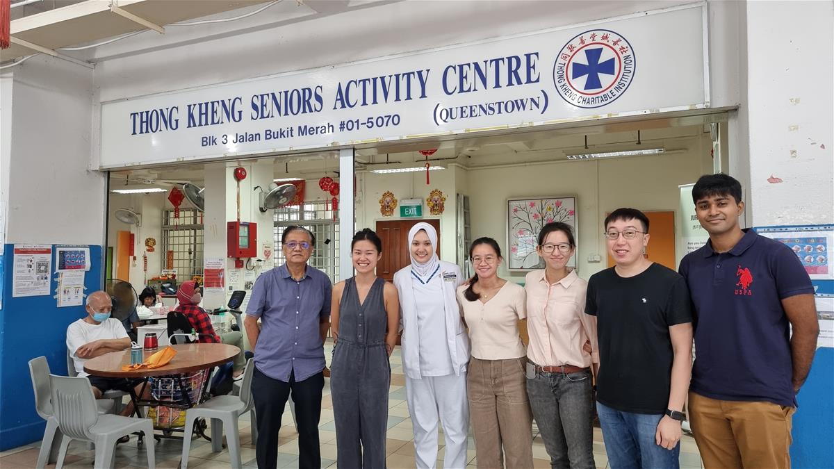 Mr Richard D Roza, Miss Nadiah and Sahad (far right) and his classmates at Thong Kheng SAC on the day of the attachment