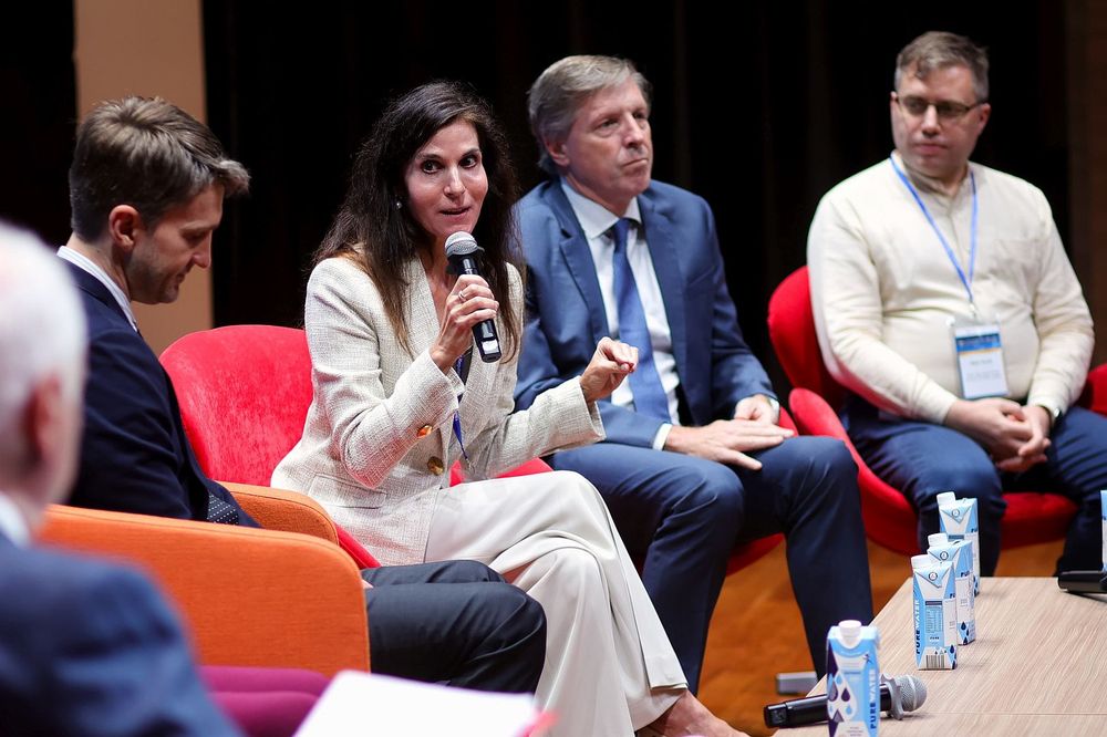 Beth Frates speaking at a symposium