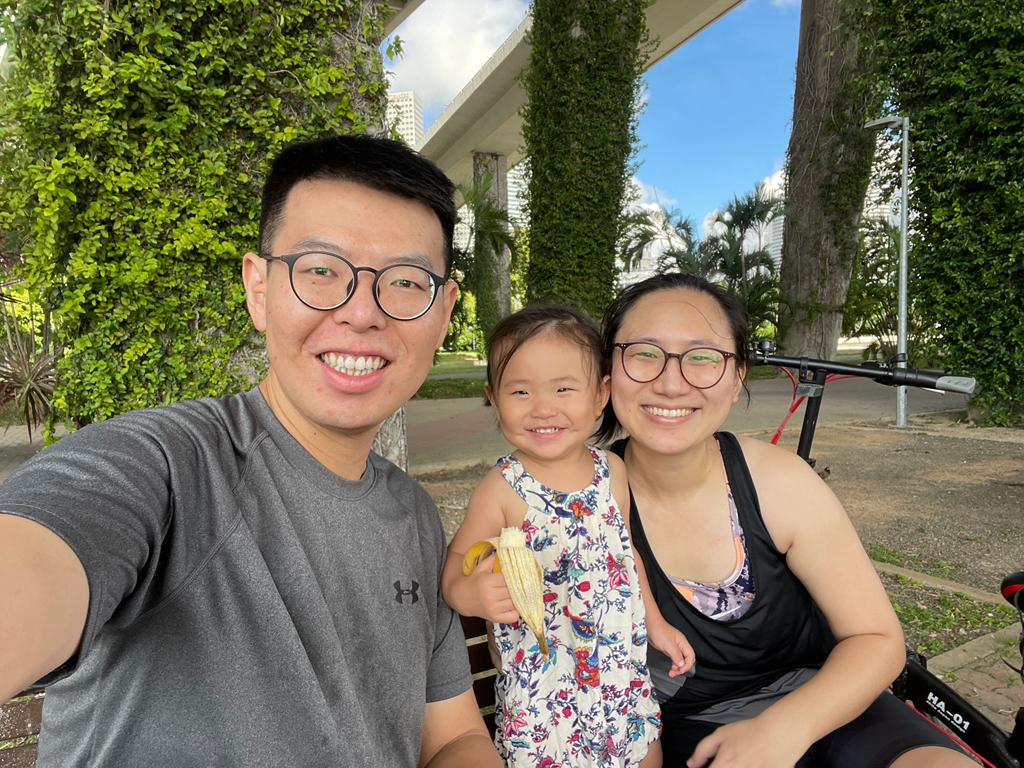 Dr Jiang Yuheng (right) with her husband and daughter at a day out cycling