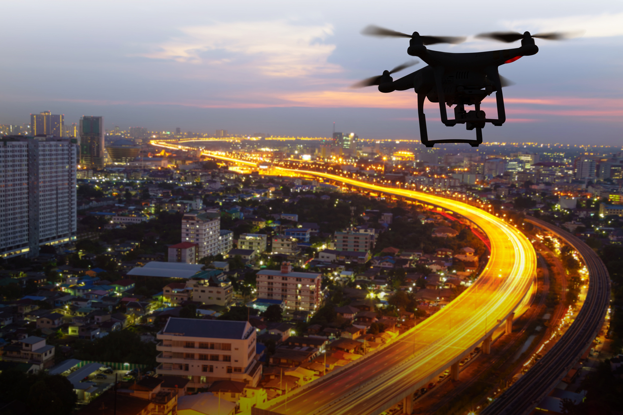 A drone flying above the city
