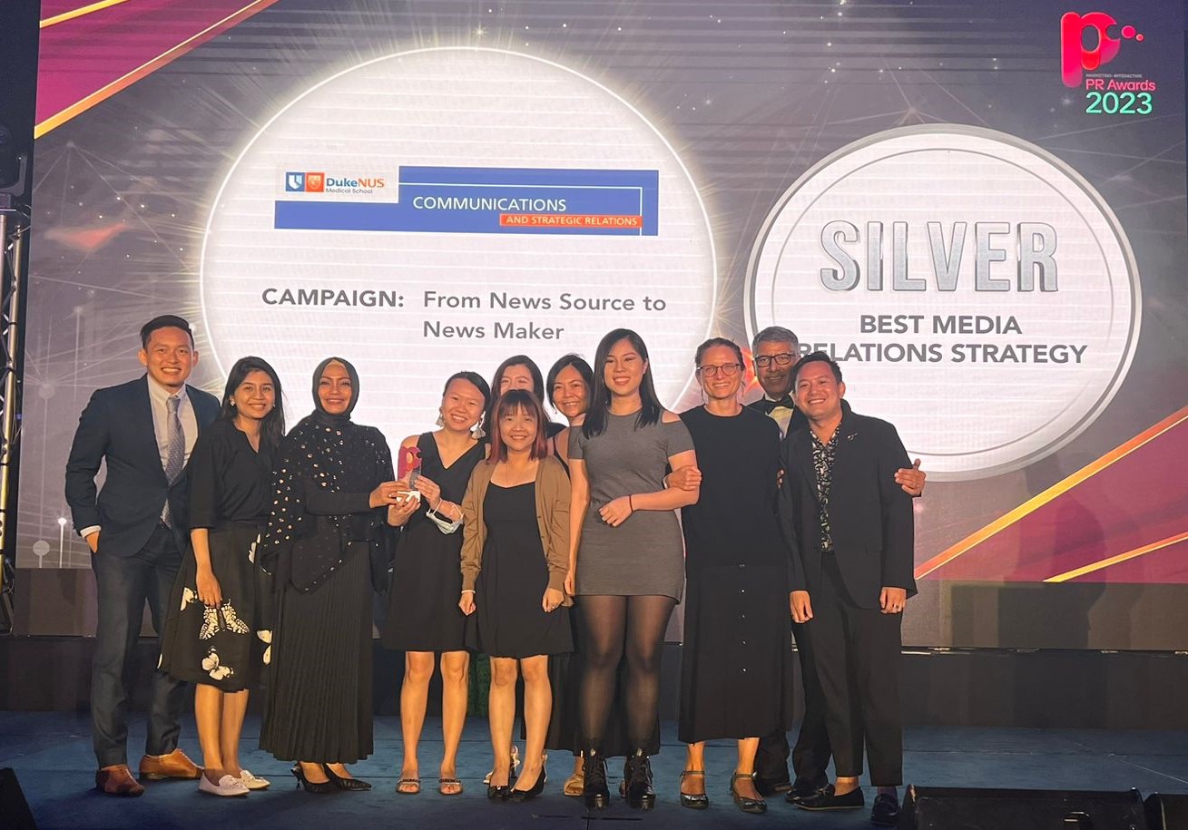 The Duke-NUS communications and strategic relations team on stage receiving their PR Award (silver) for best media relations strategy