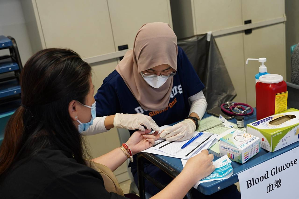 Duke-NUS students honoured for decade of CDAC volunteering