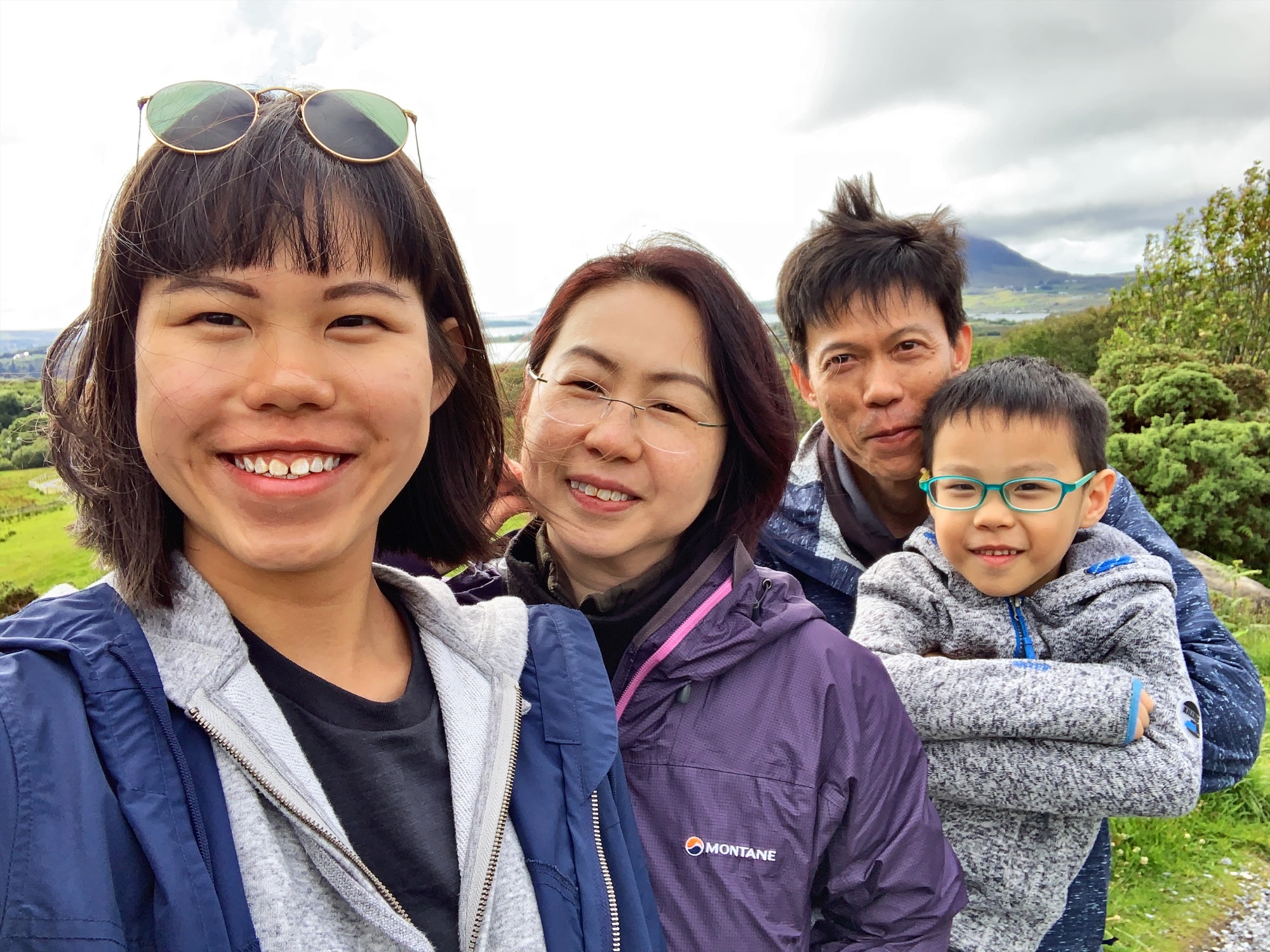 A family photo of Lok Shee Mei with her husband and two children on holiday