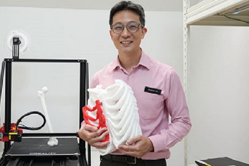 SGH Dr Mark Tan holds a 3D printed specimen