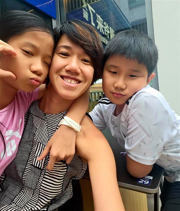 Spending time with the kids as much as I can, whether waiting with them for the school bus every morning or glamping at East Coast Park during the school holidays in November 2024 // Credit: Rena Dharmawan