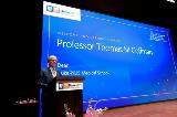 Duke-NUS Dean Professor Thomas Coffman welcomes the audience in the auditorium and online