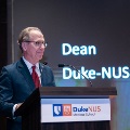 Duke-NUS Dean Professor Thomas Coffman welcomes the audience in the auditorium and online