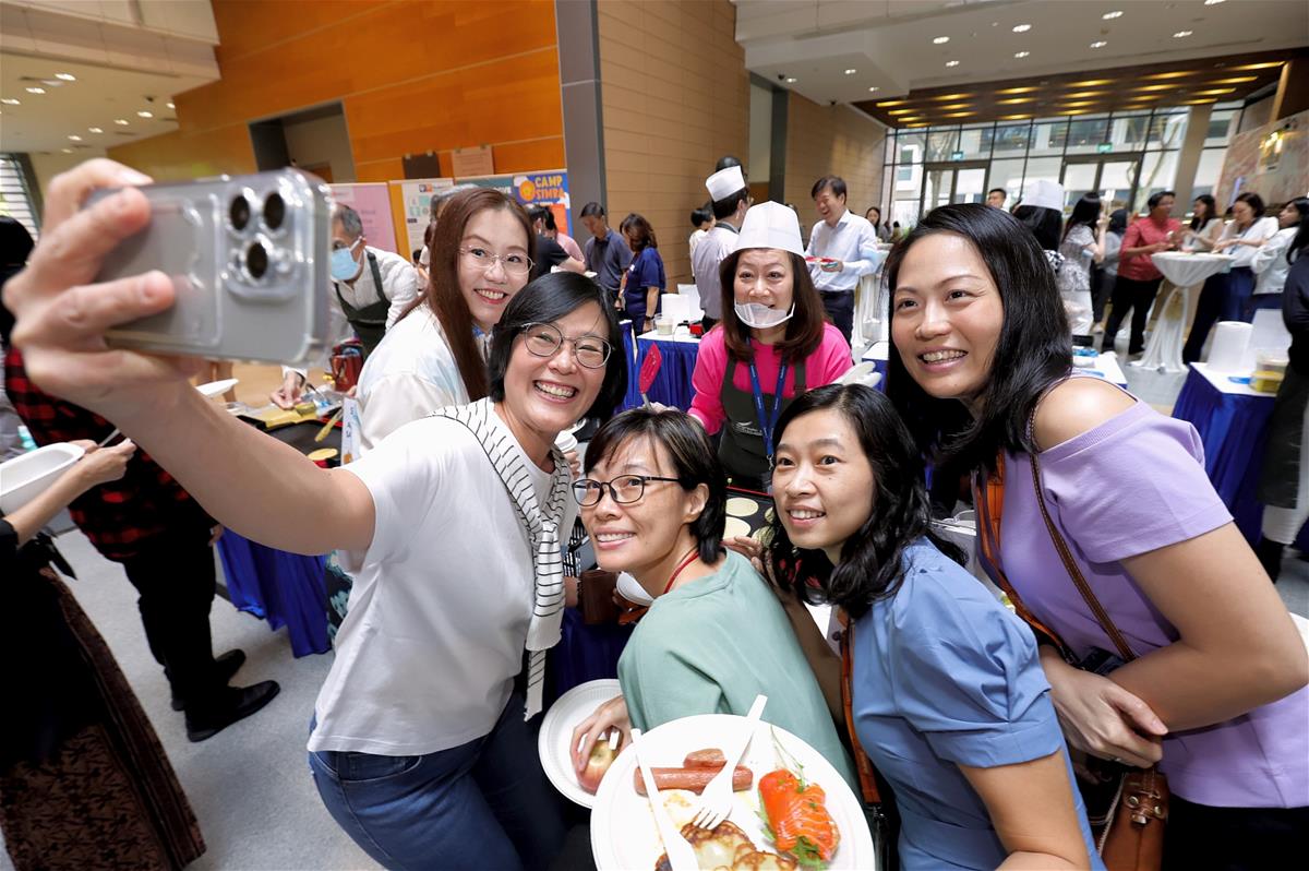 Ms Karen Chang, Senior Vice-Dean and Group Director of Corporate Services, and the IT team