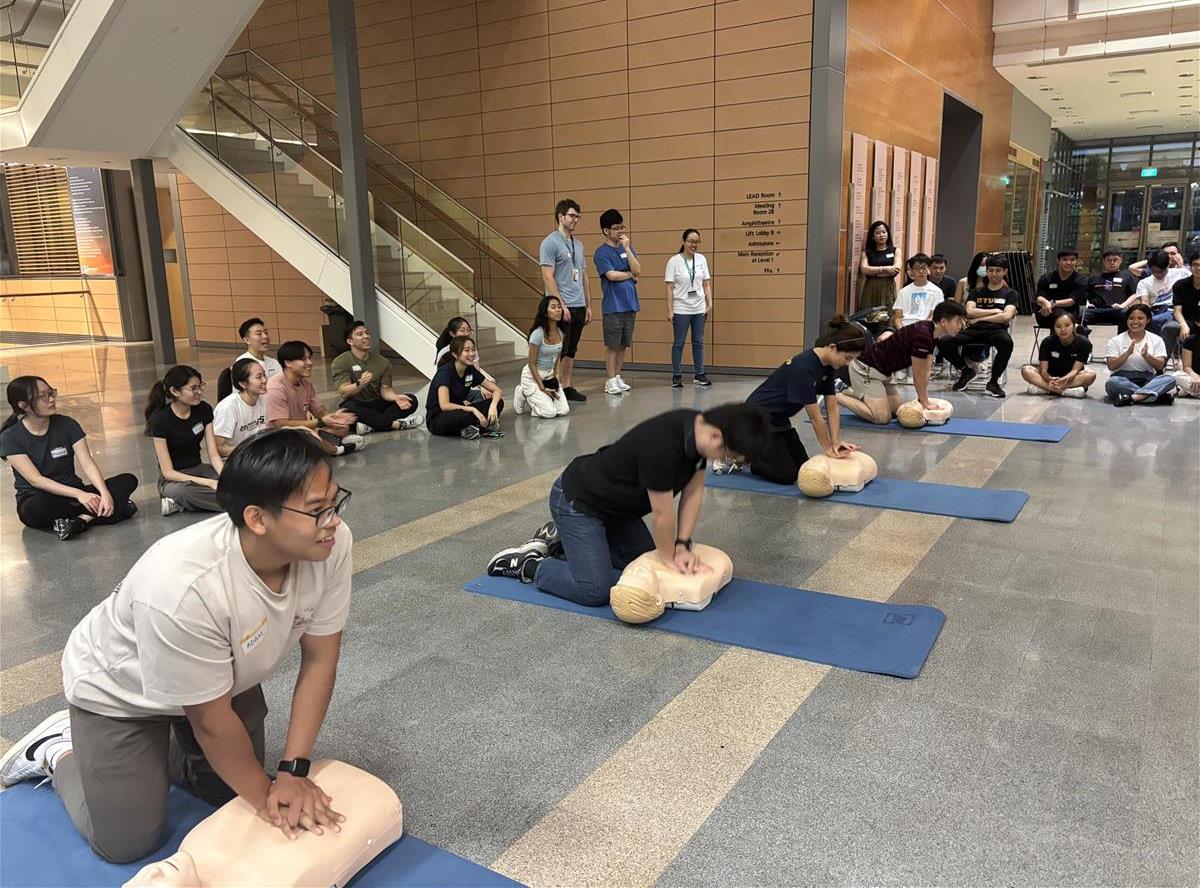The students participated in a fast-paced CPR relay race, with Seah College celebrating their win.