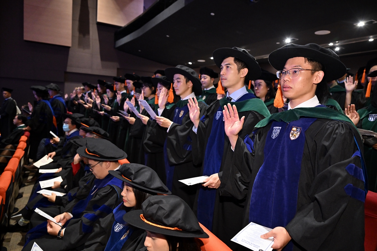 The newly minted doctors pledge to uphold the principles of the Hippocratic Oath in their practice // Credit: Se7en Friday for Duke-NUS