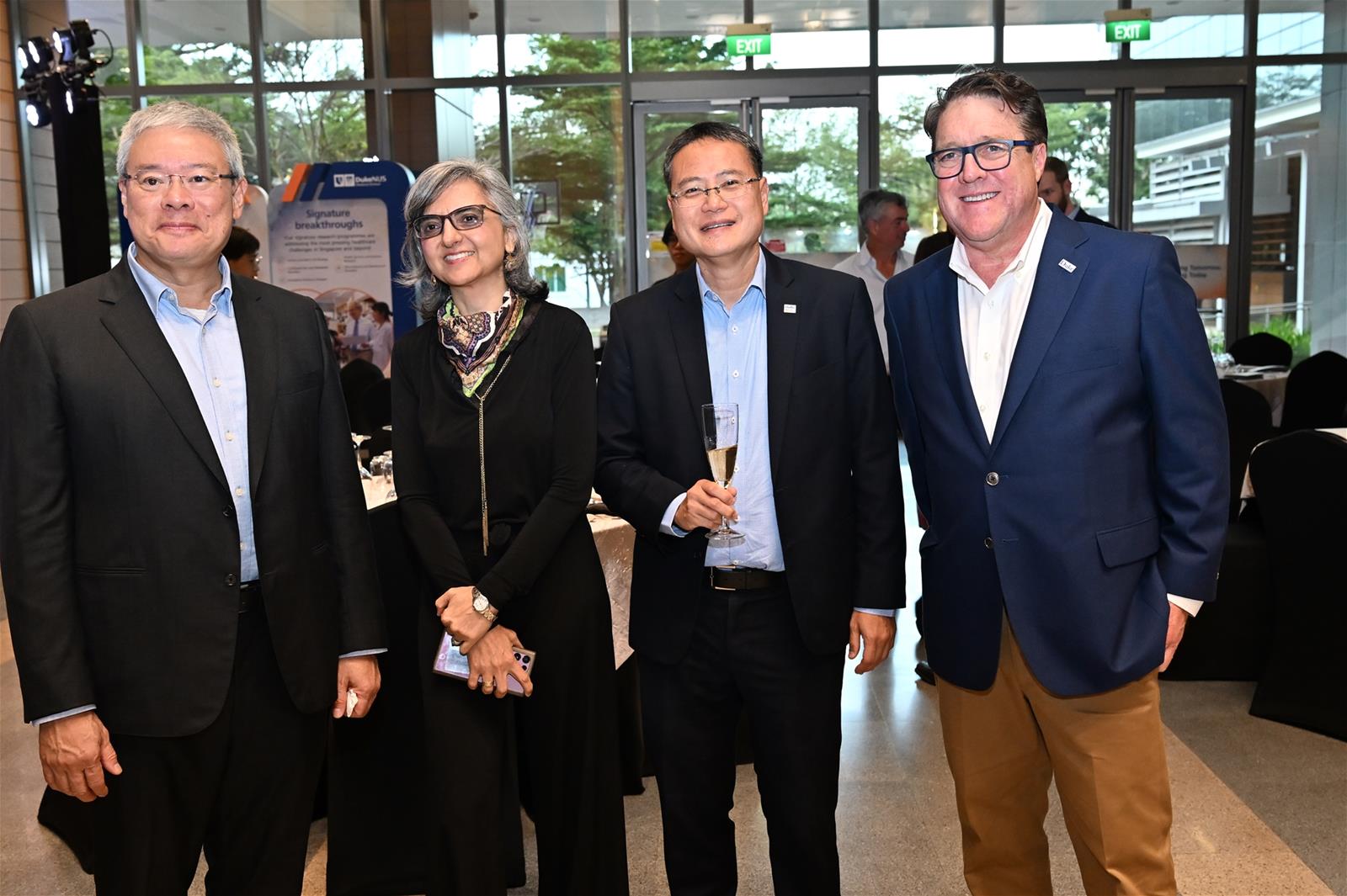Duke-NUS Governing Board member Mr Lee Ming San, Duke-NUS Vice-Dean for Education Associate Professor Shiva Sarraf-Yazdi, SingHealth Group CEO Professor Ng Wai Hoe and Duke University Vice-President for Government Relations Mr Chris Simmons pose for a photo during the reception in the Duke-NUS Atrium.