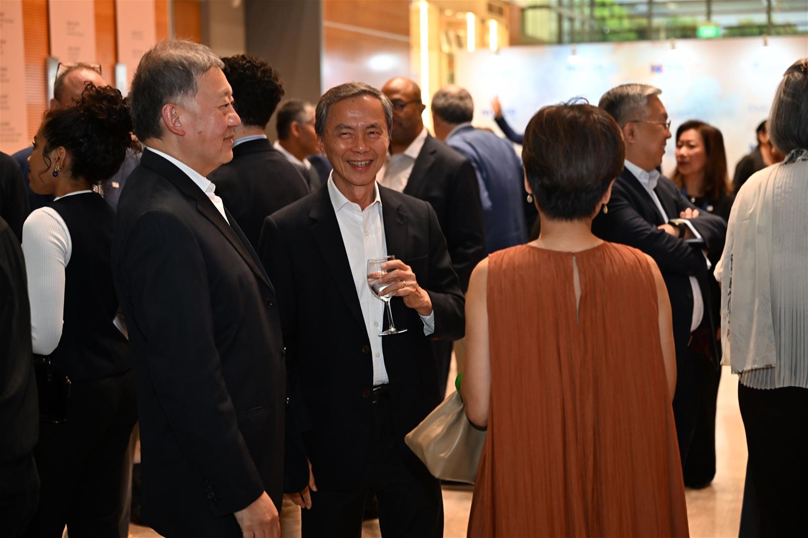 Duke-NUS Governing Board Chair Mr Goh Yew Lin and NUS Board of Trustees Chair Mr Hsieh Fu Hua in conversation with Duke-NUS Governing Board member Ms Lee Sze Yeng.