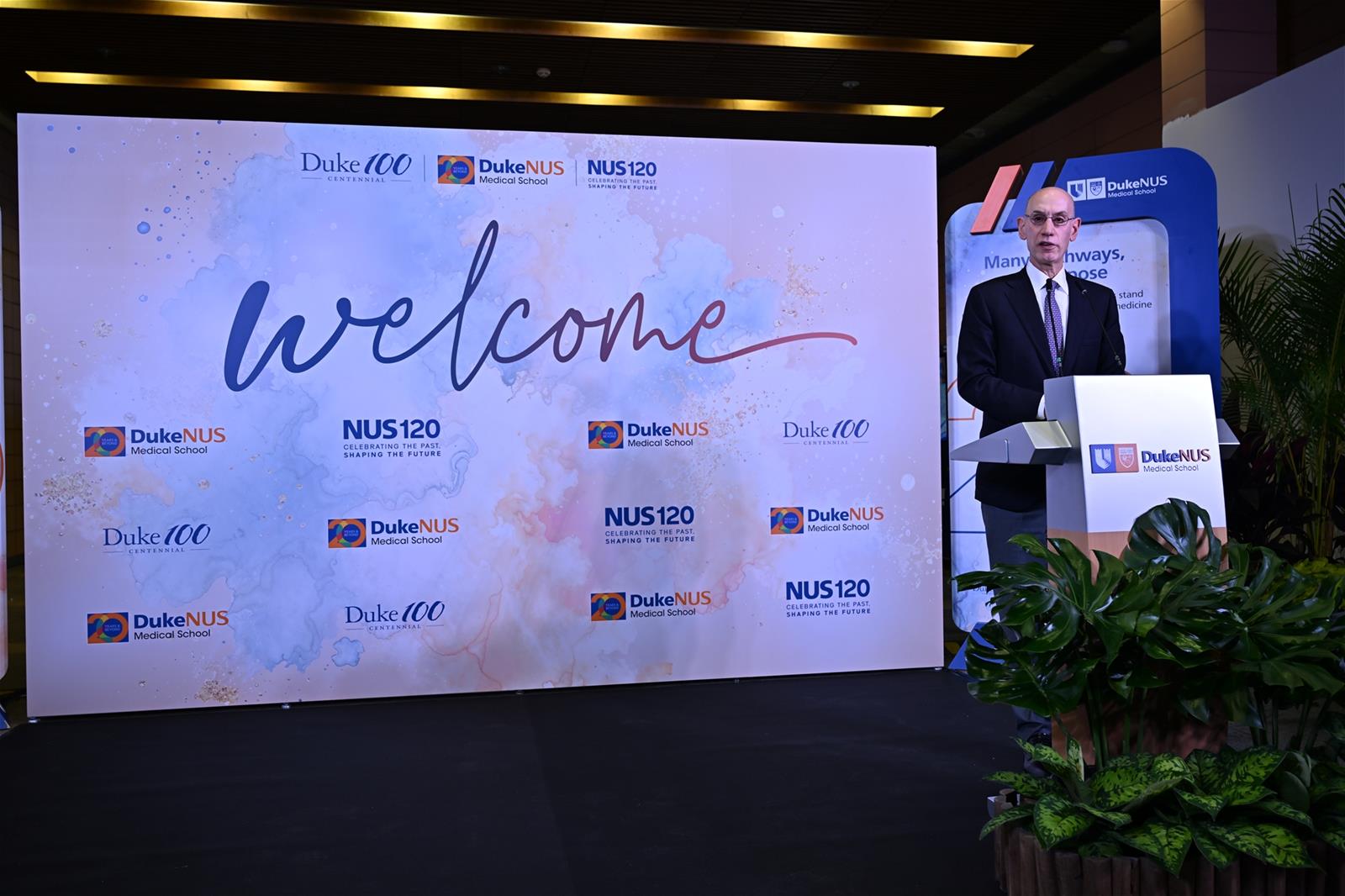 Duke Board of Trustees Chair Mr Adam Silver addresses the distinguished guests