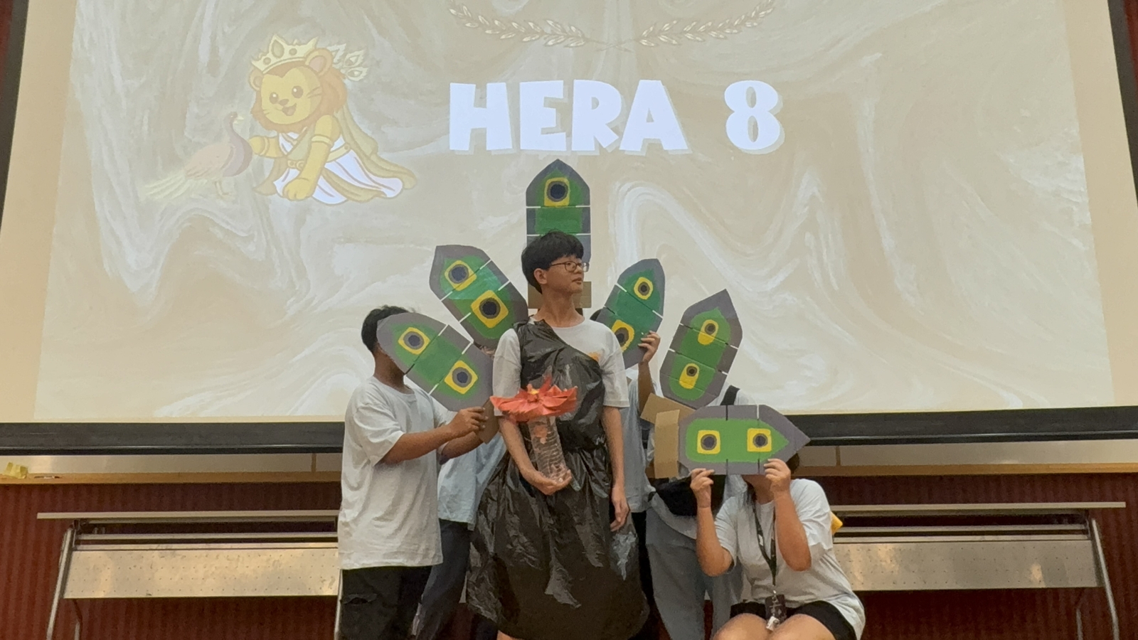 A team from house Hera shows off its self-made costume.