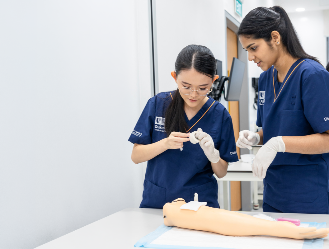 Two medical students having a discussion