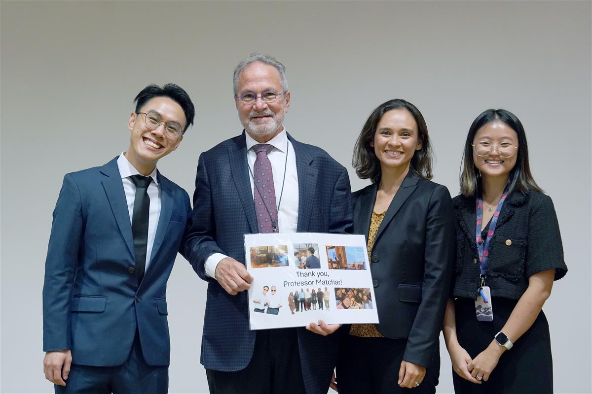 The proud mentor with his students: Postdoctoral researcher and emcee for the day, Dr Lai Wei Xuan (first from left); Dr Marya Getchell (second from right) and Dr Vanessa Koh (first from right)