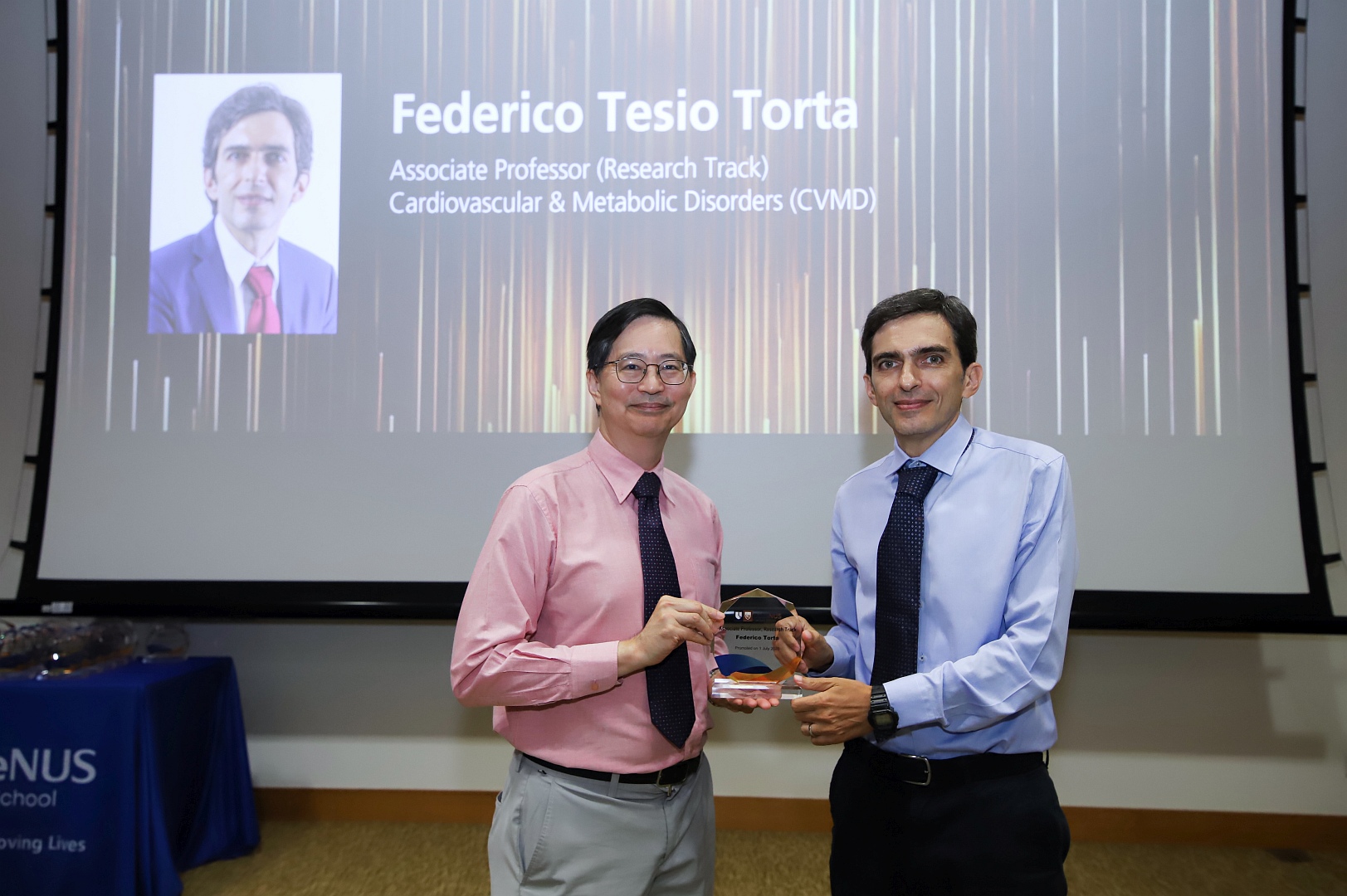 Dean Patrick Tan with Assoc Prof Federico Tsio Torta