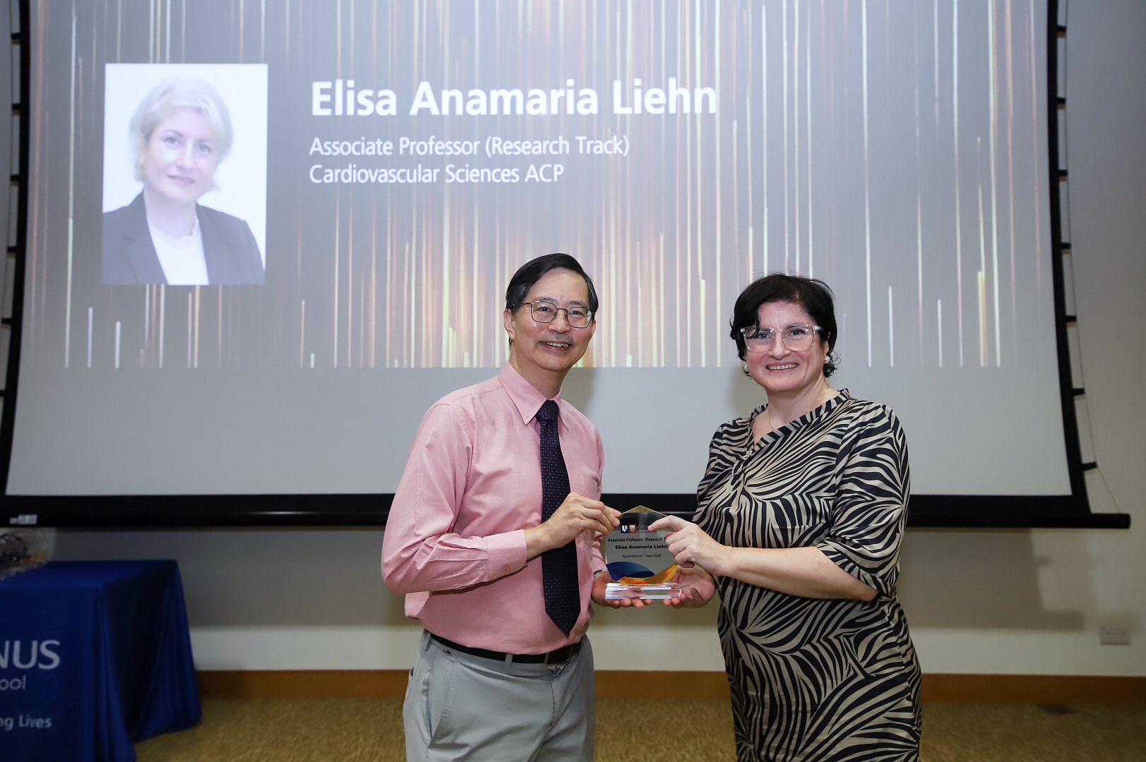 Dean Patrick Tan with Assoc Prof Elisa Anamaria Liehn
