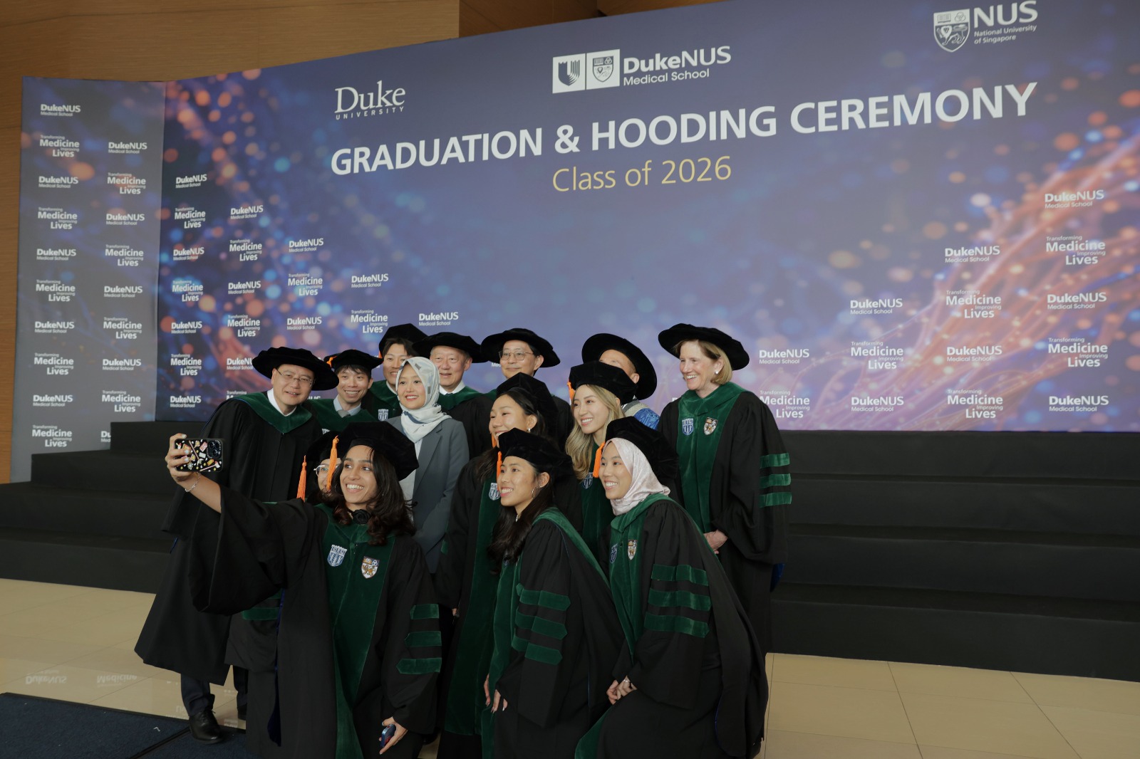 Mdm Rahayu Mahzam with graduates from the Duke-NUS Medical School Class of 2026 and leaders from Duke-NUS, Duke University, NUS and SingHealth