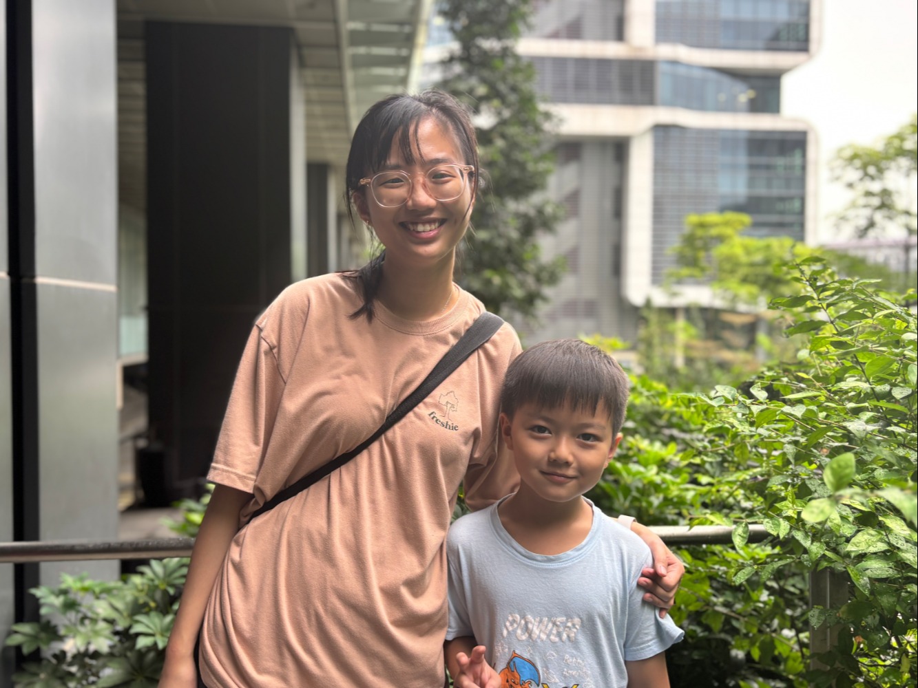 Fang Kexin of the Duke-NUS MD Class of 2028 (left) with Lucius, one of her campers