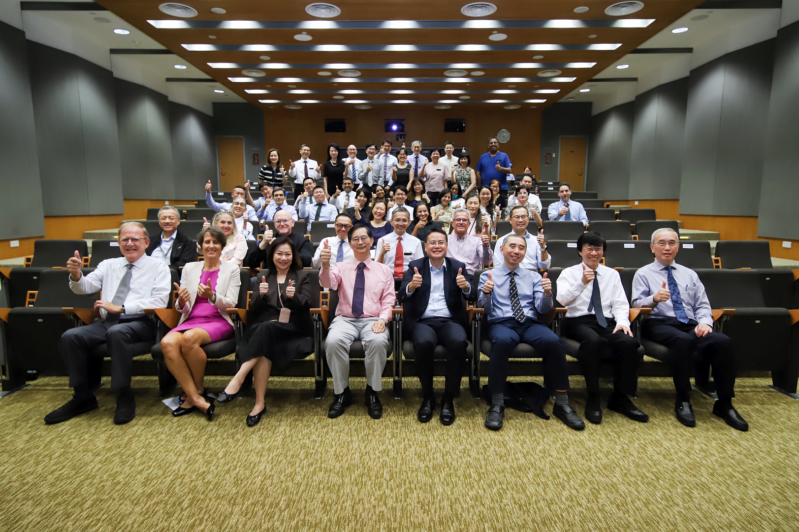 Group photo at Duke-NUS Amphitheatre for Faculty Recognition 2026