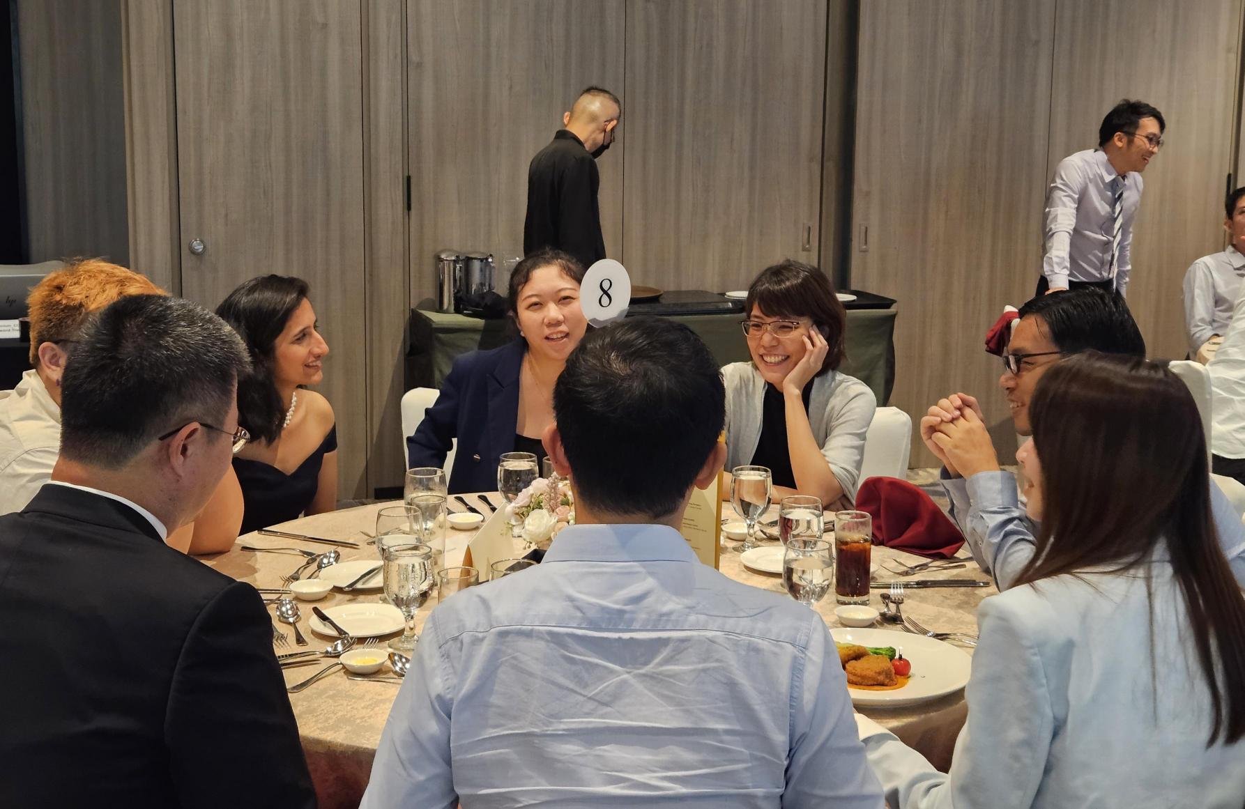 A table of our cherished alumni enjoying scintillating conversation over their meal.