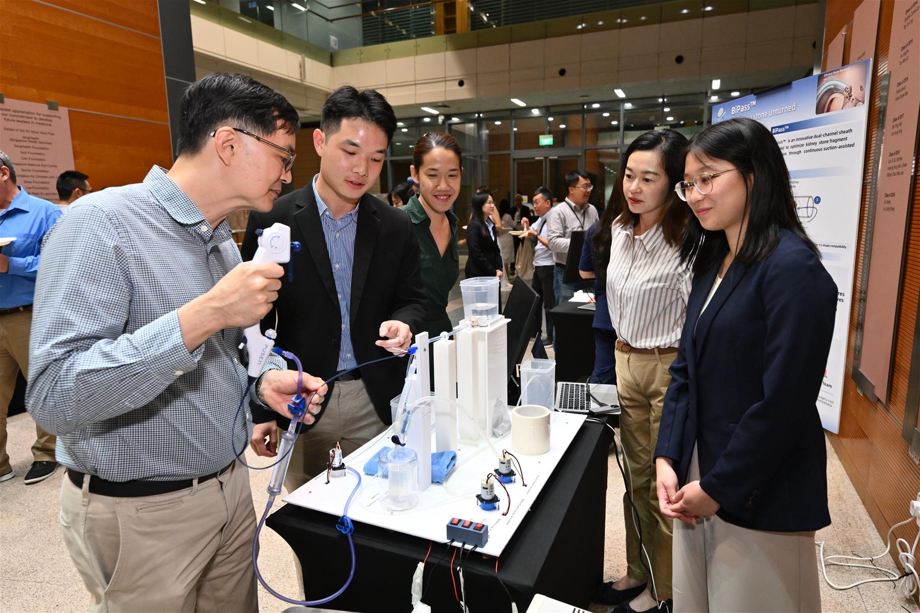 Team UroClear and their kidney stone removal device prototype // Image credit: Duke-NUS Medical School