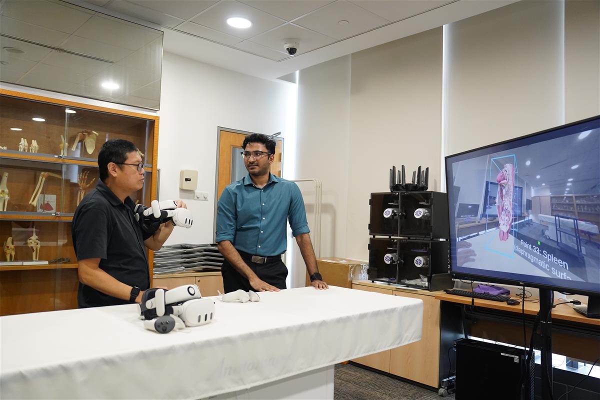 Sham works closely with Dr Lu Weiquan at the to design educational apps and software for medical students // Credit: Duke-NUS