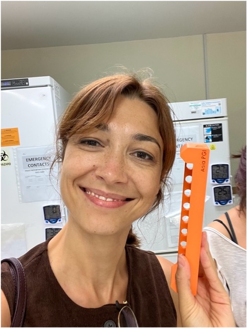 Miruna with an in-house designed magnetic rack used for sequencing library preparation during her first week at the Duke-NUS Centre for Outbreak Preparedness