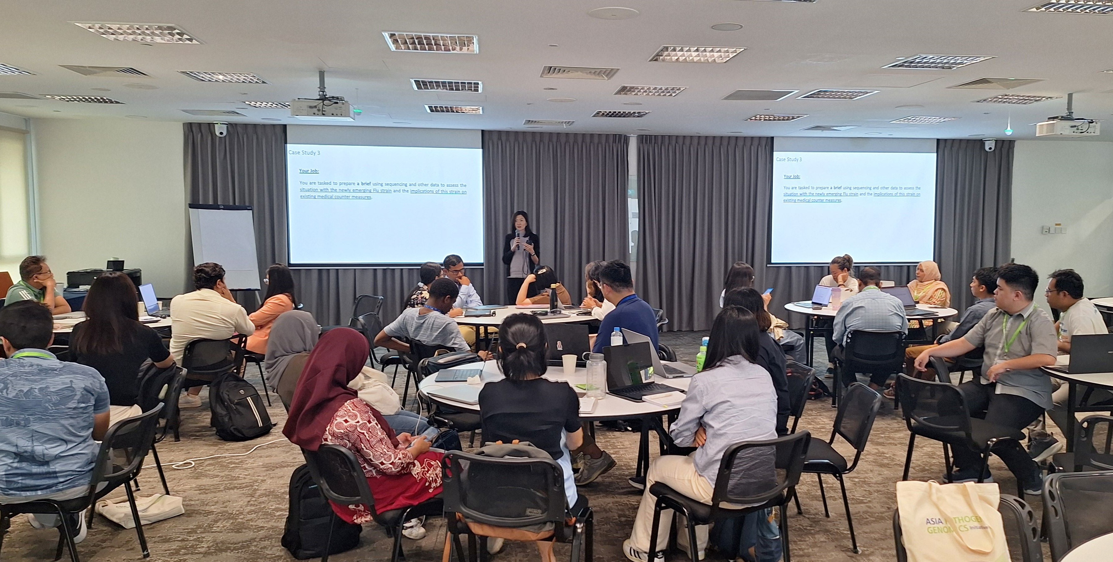 Workshop participants listening to a presentation