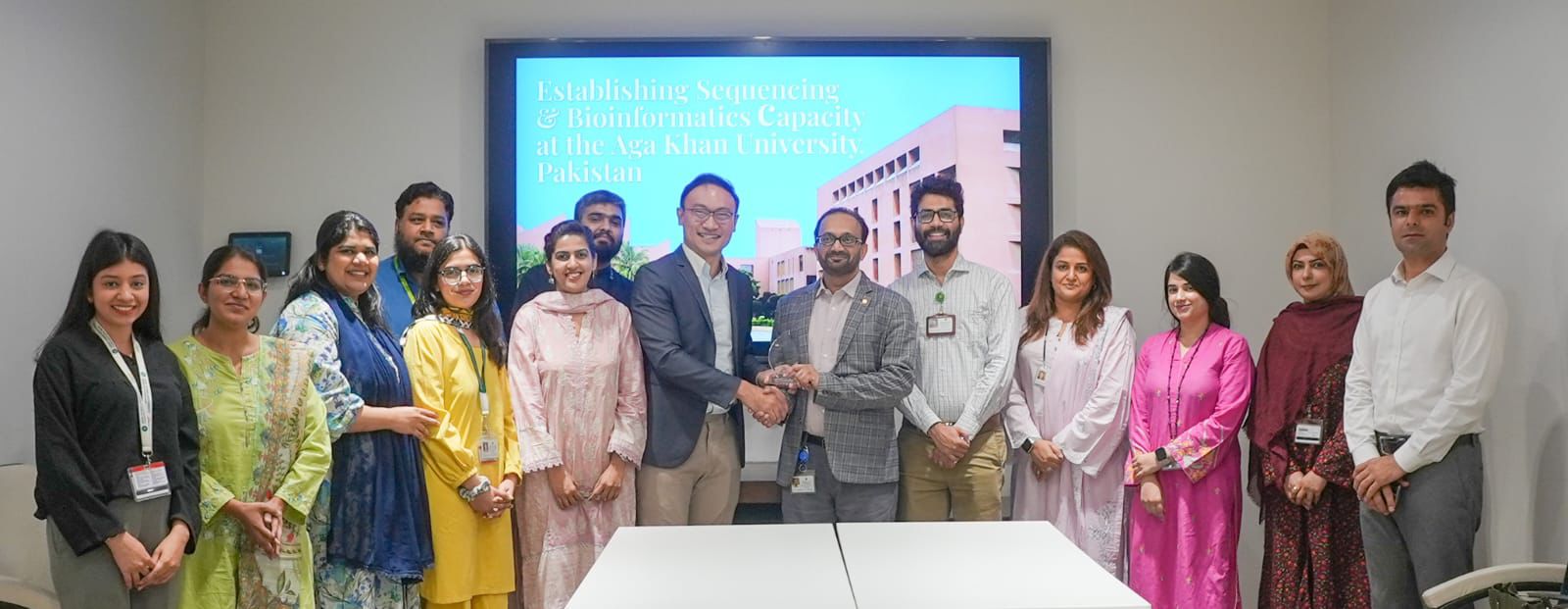Group photo with the AKU team