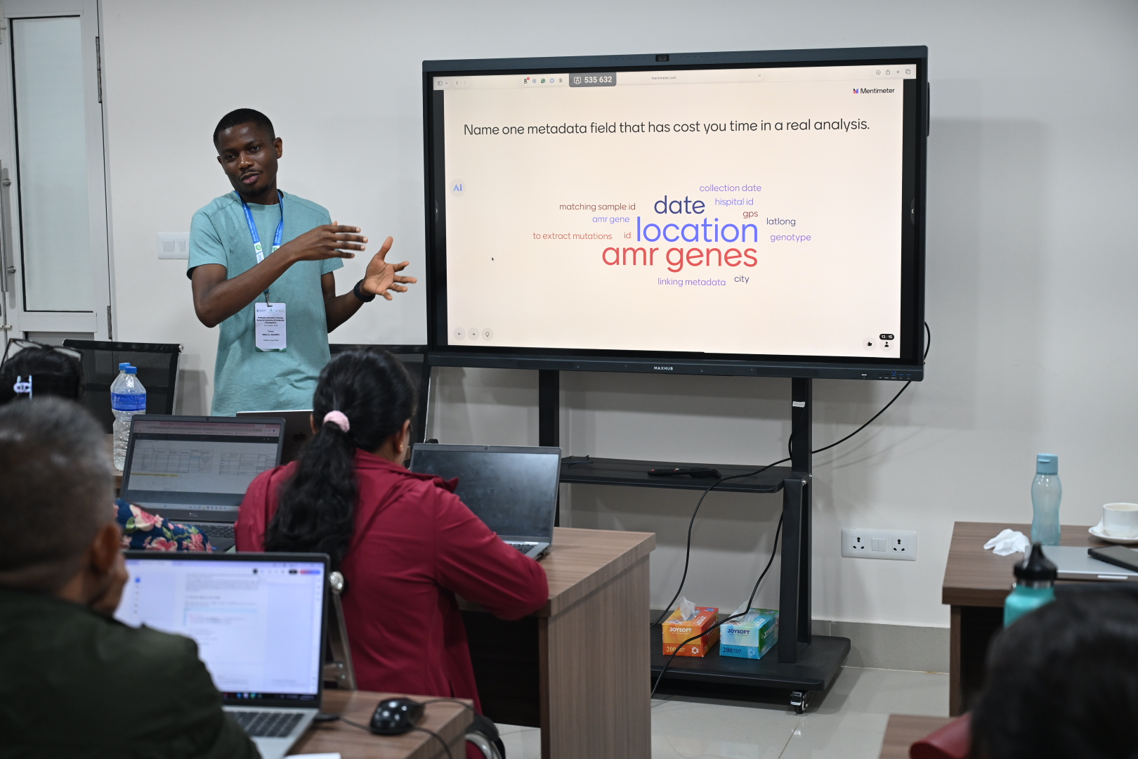 Dr. Paul E. Oluniyi facilitating a group discussion on pathogen genomics