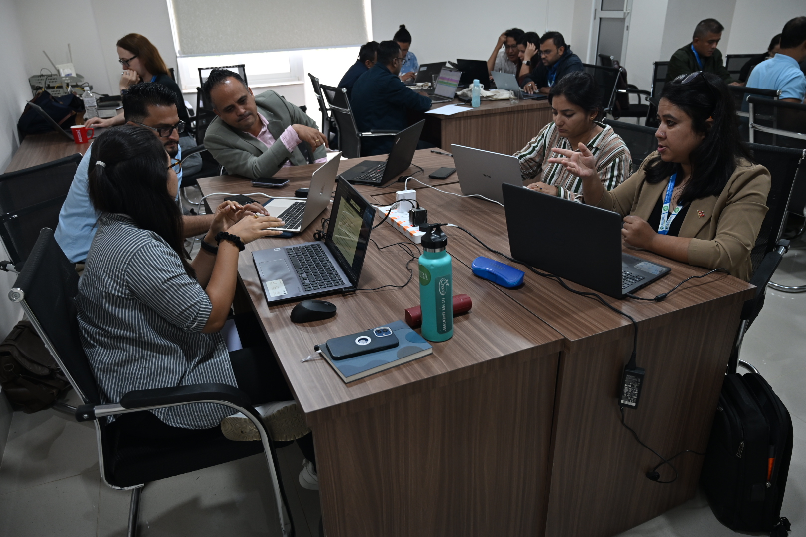 Workshop participants engage in a simulated outbreak investigation