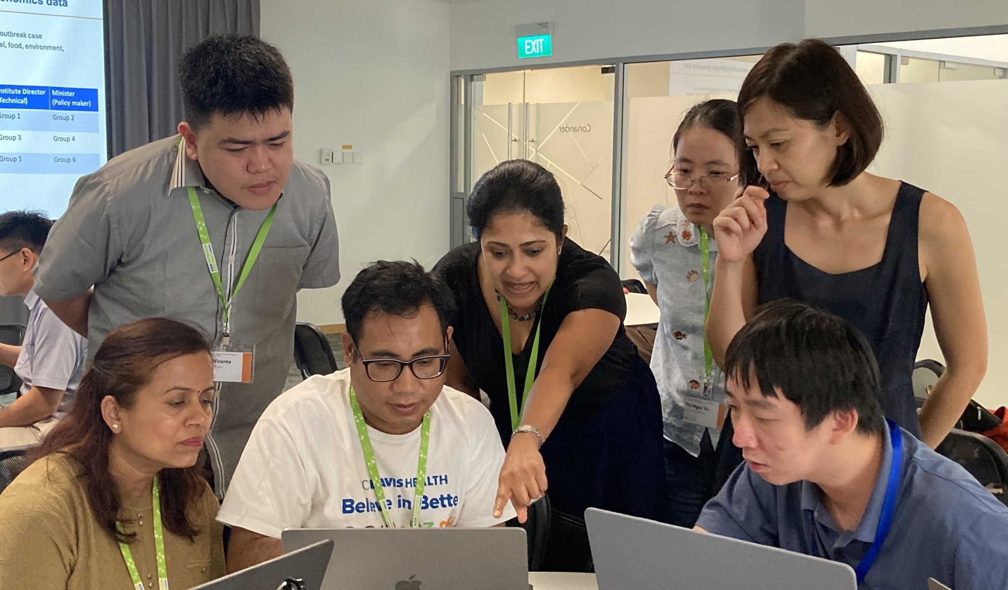 Workshop participants working together on a group assignment