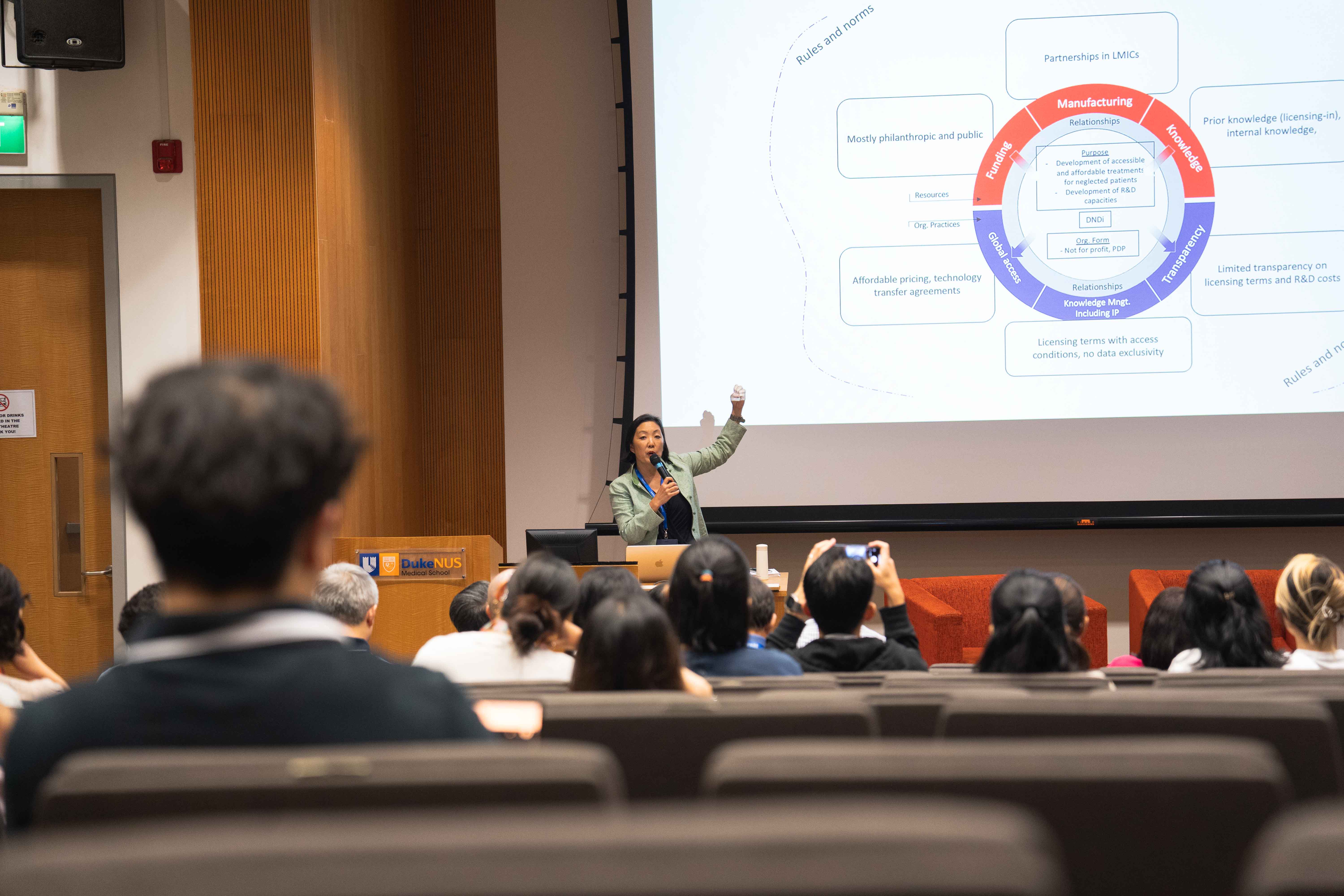 Prof Suerie Moon giving a talk