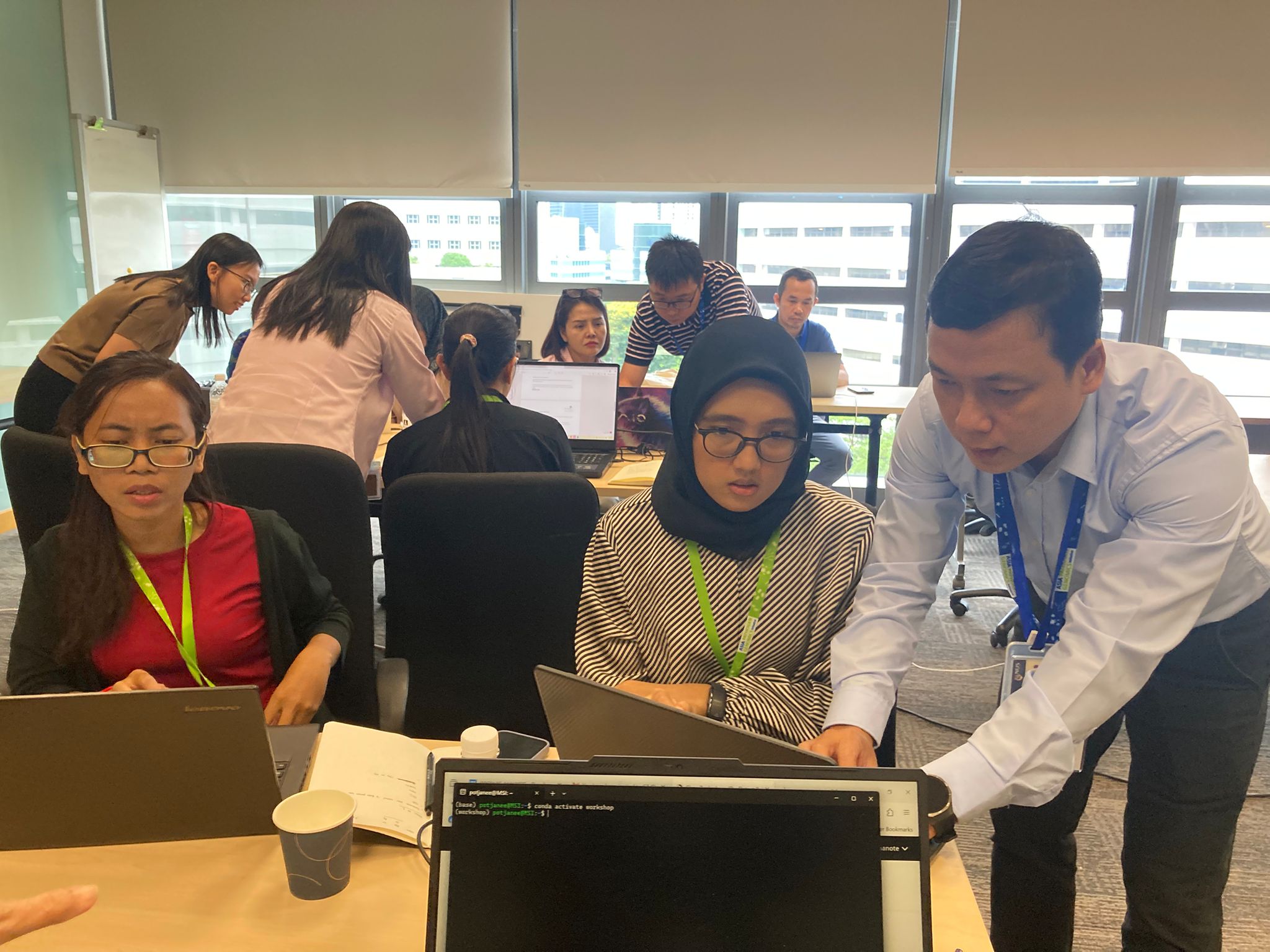 Workshop participants and trainers participating in a bioinformatics session